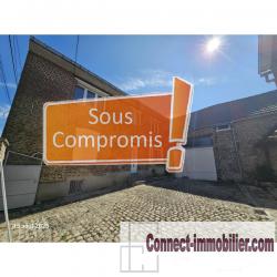 LONGERE AVEC GRANGES ET MAISON